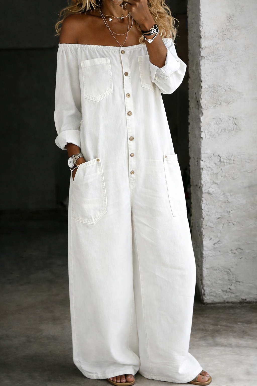 Elena off-shoulder denim jumpsuit in white, full-length front view