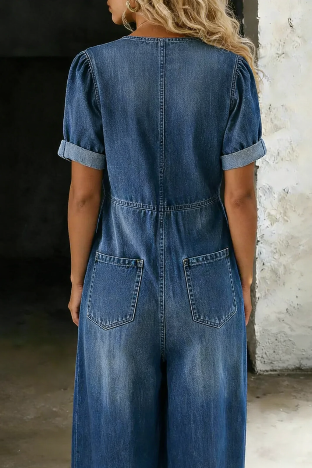 Maya V neck jumpsuit in blue, back view with two pockets