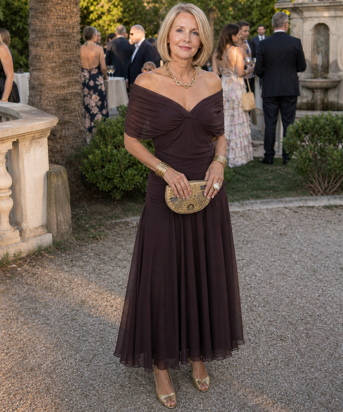 Flow midi dress in brown worn at an outdoor garden party