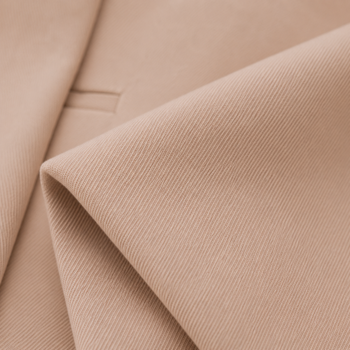 Elfrida cropped trouser suit in beige, close-up of twill fabric texture