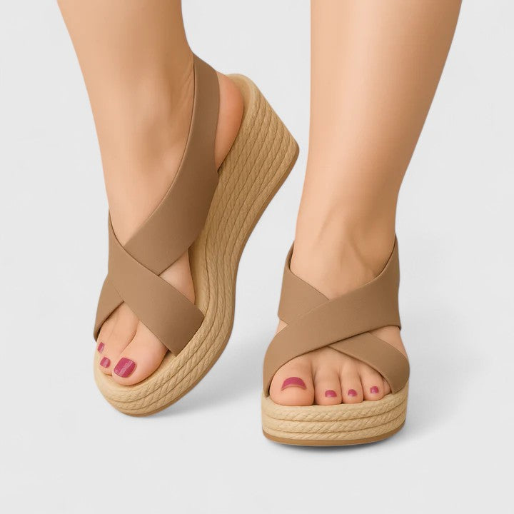 Marilysa crossover wedge sandals in brown, worn front view