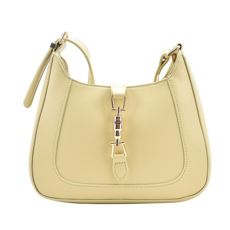 Classic curved shoulder bag in yellow, front view