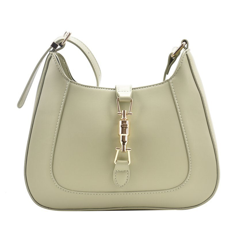 Classic curved shoulder bag in green, front view