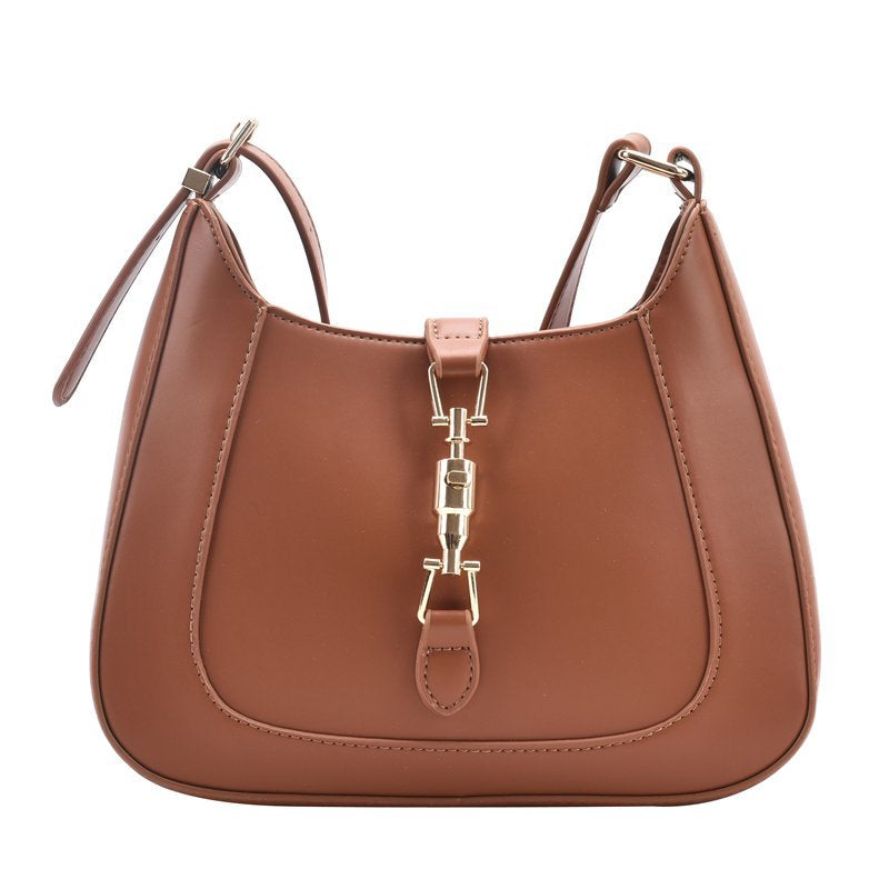 Classic curved shoulder bag in brown, front view with gold-tone clasp