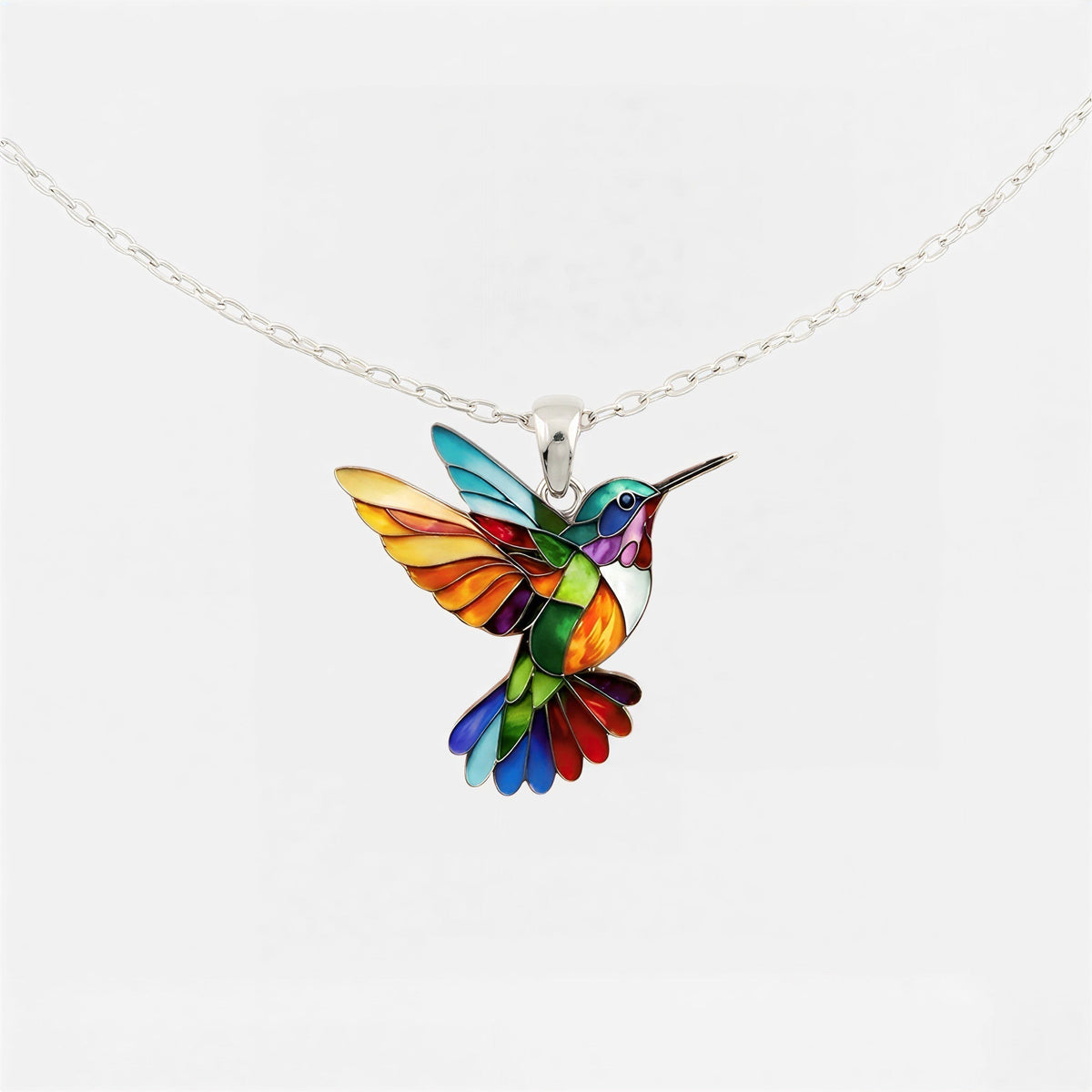 Lucky Hummingbird pendant necklace in multicolour on a silver chain, front view