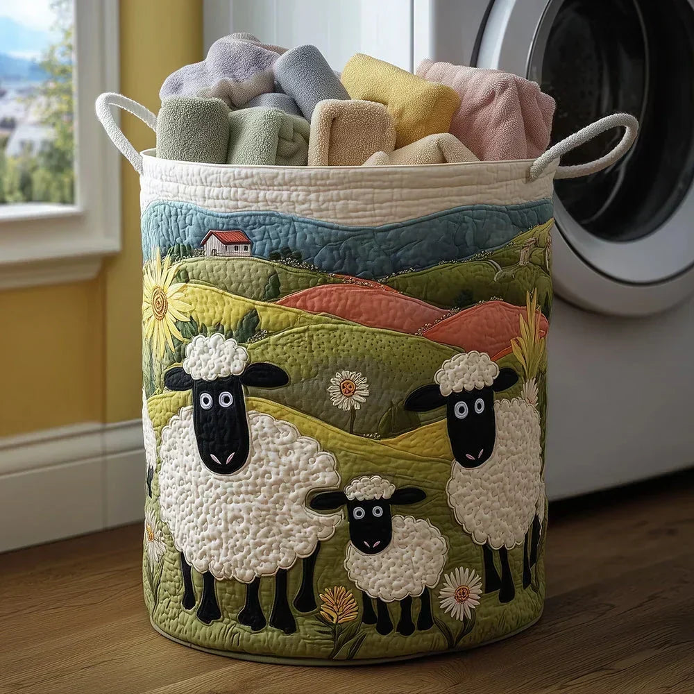 Nora hand-quilted laundry basket with embroidered sheep and green hills, filled with folded towels