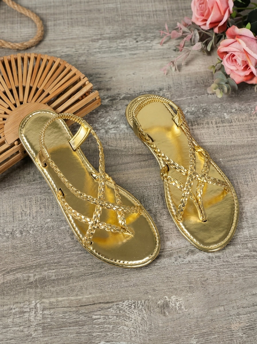 Luceria braided flat sandals in gold, pair from above