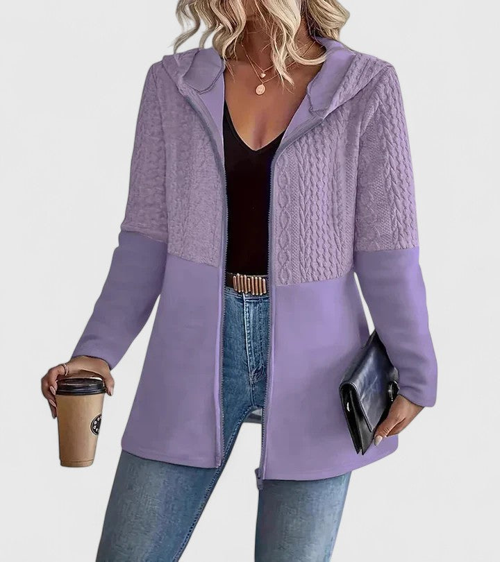 Iolanthe longline hooded jacket in purple, front view with cable knit panels