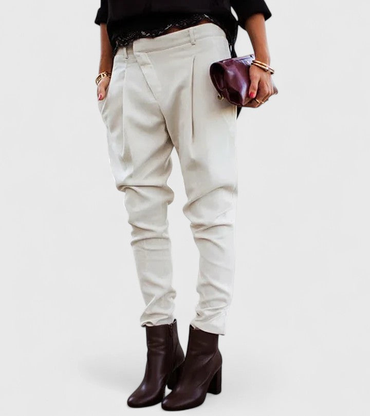 Marceline elegant tapered trousers in cream, styled with brown ankle boots