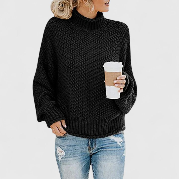 Emoryanne chunky knit turtleneck sweater in black, front view
