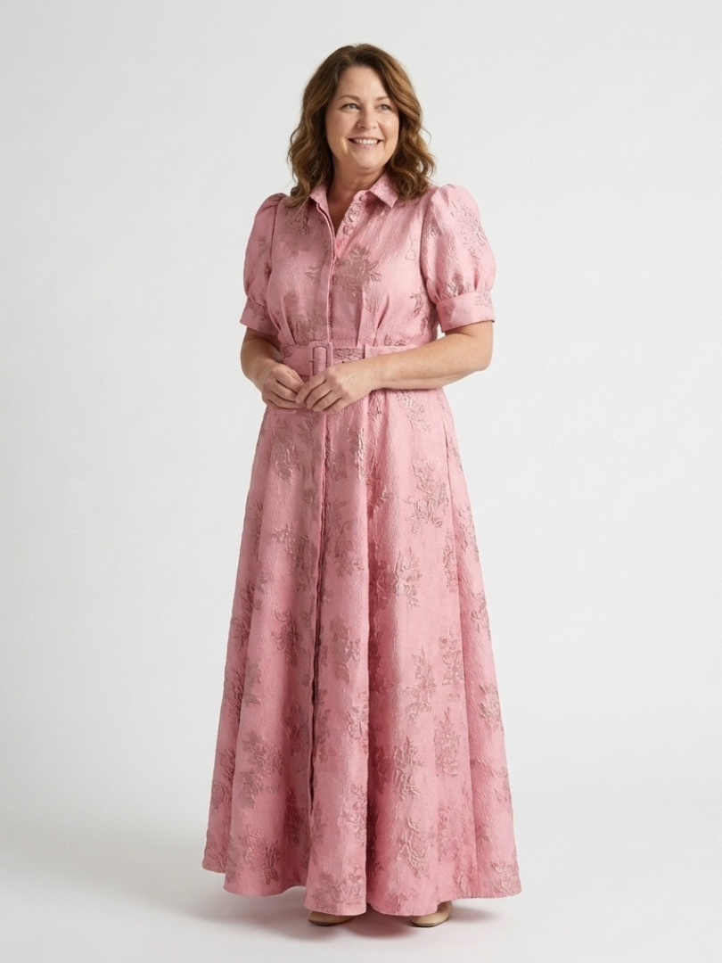 Xanthea pink textured maxi shirt dress worn with belt fastened at the waist