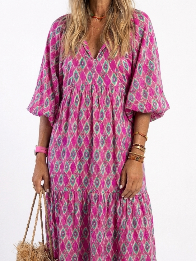 Apolline patterned midi dress in purple, close-up of V neckline and sleeves