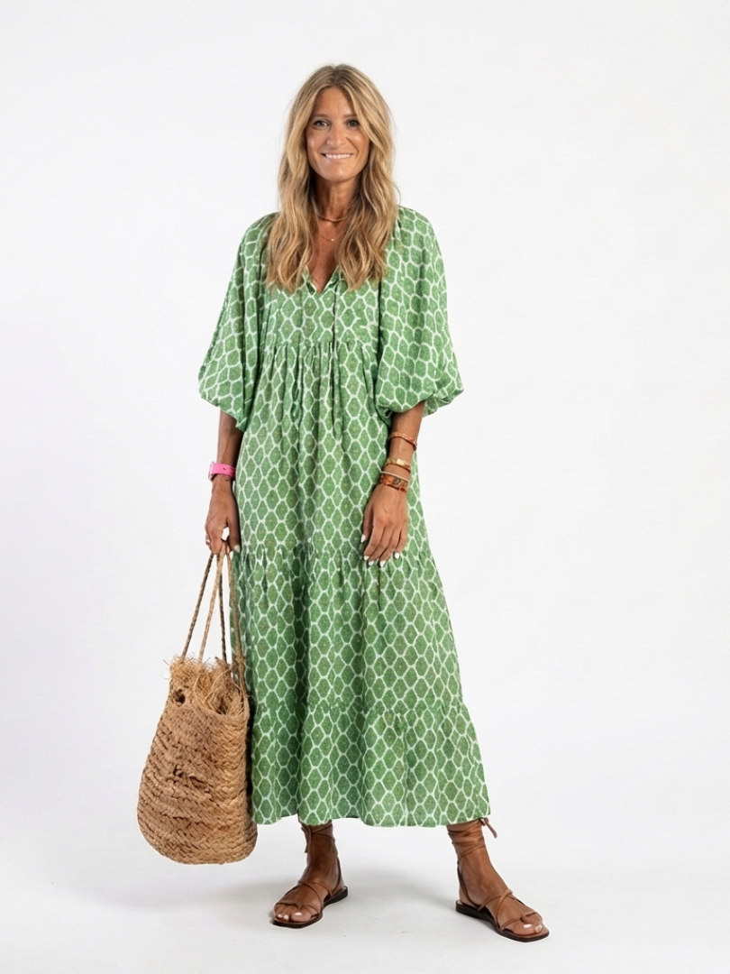 Apolline patterned midi dress in green, full-length front view