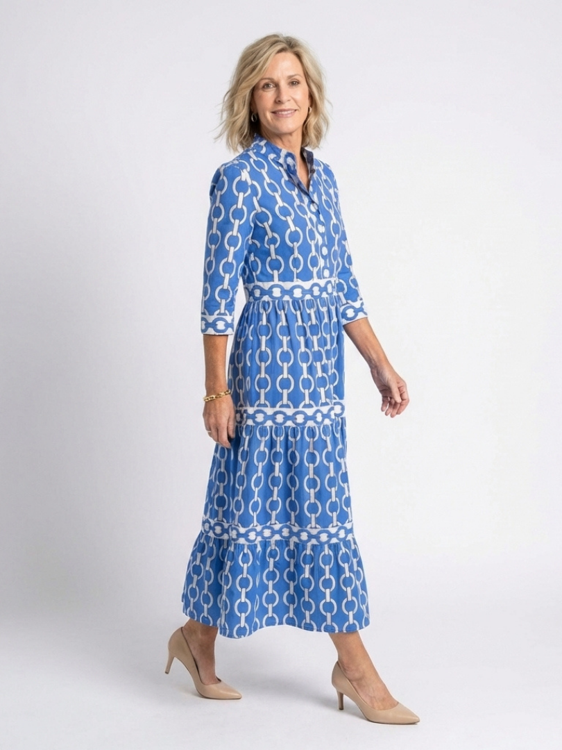 Ysolde chain pattern midi dress in blue, side view showing tiered skirt