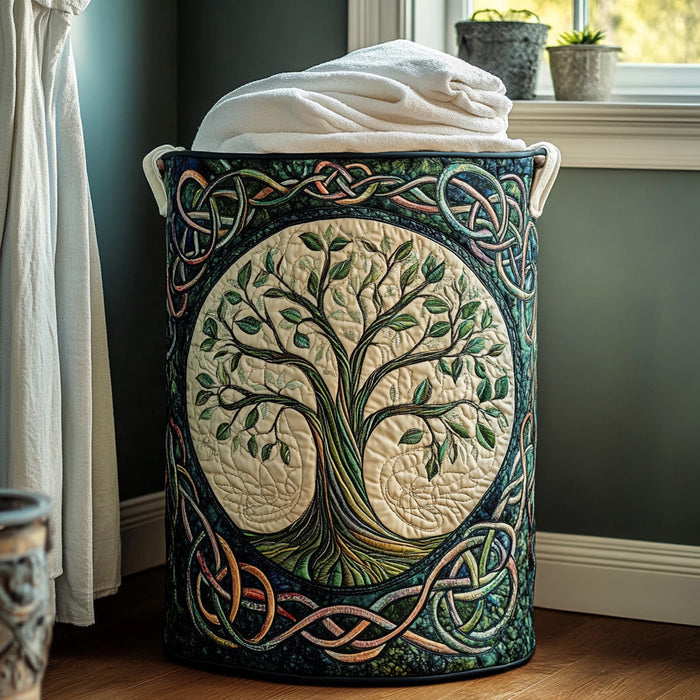 Rosalia hand-quilted laundry basket with green tree of life design, filled with white towels
