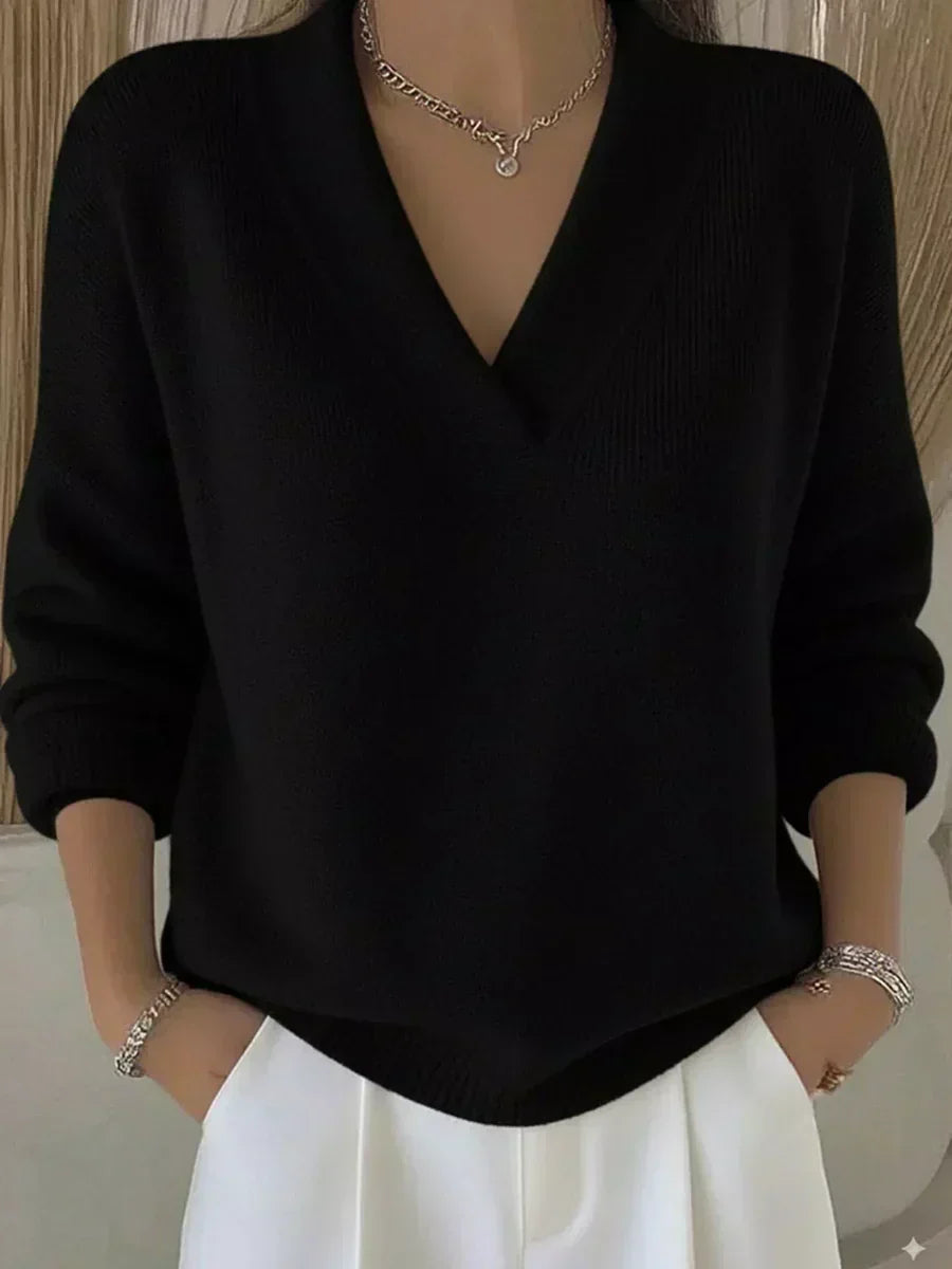 Violeta relaxed V-neck jumper in black, front view on model
