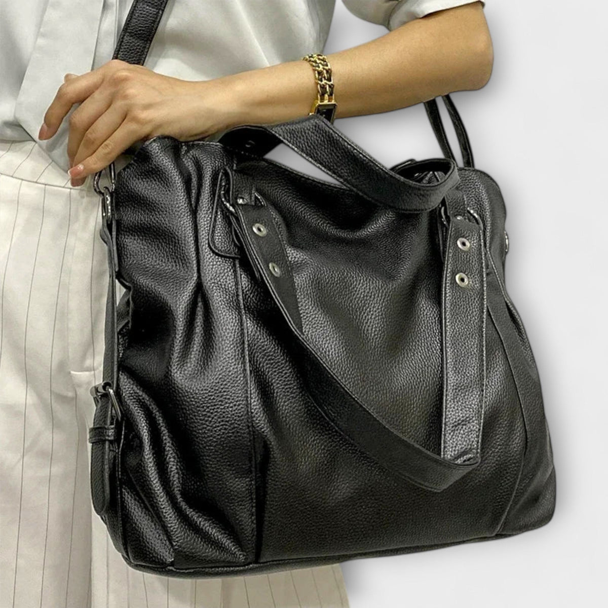 Bellefort Paris hobo shoulder bag in black, close view of handles and strap