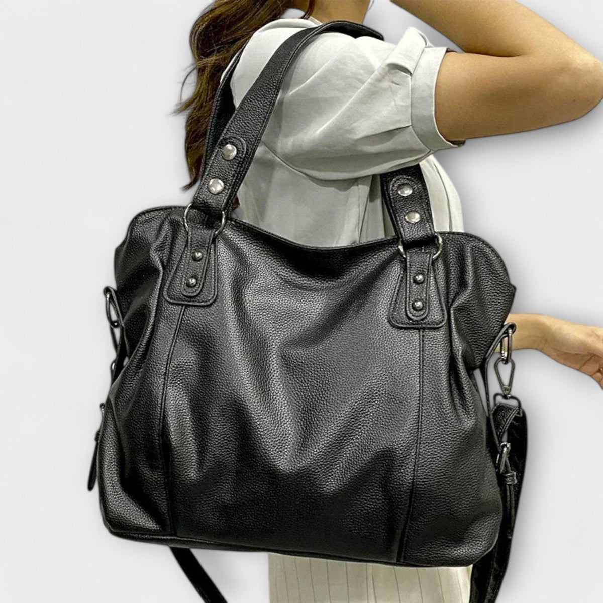 Bellefort Paris hobo shoulder bag in black carried on the shoulder