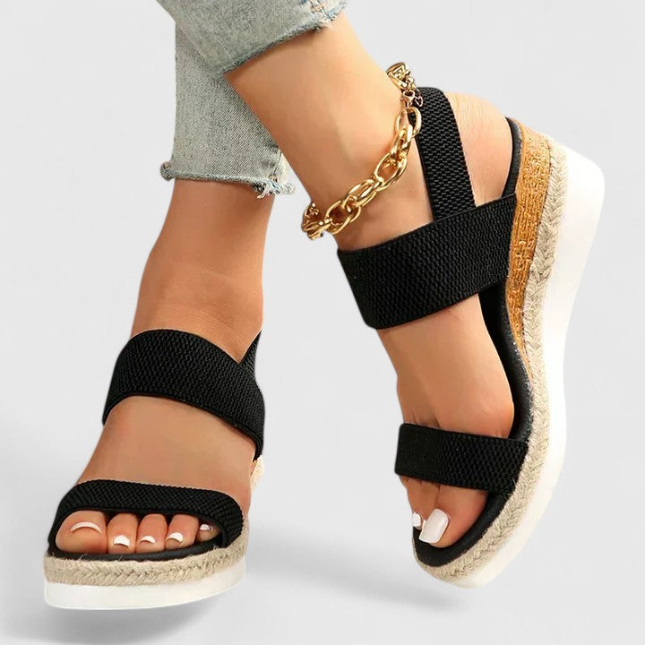 Merill orthopedic wedge sandals in black, close-up strap detail