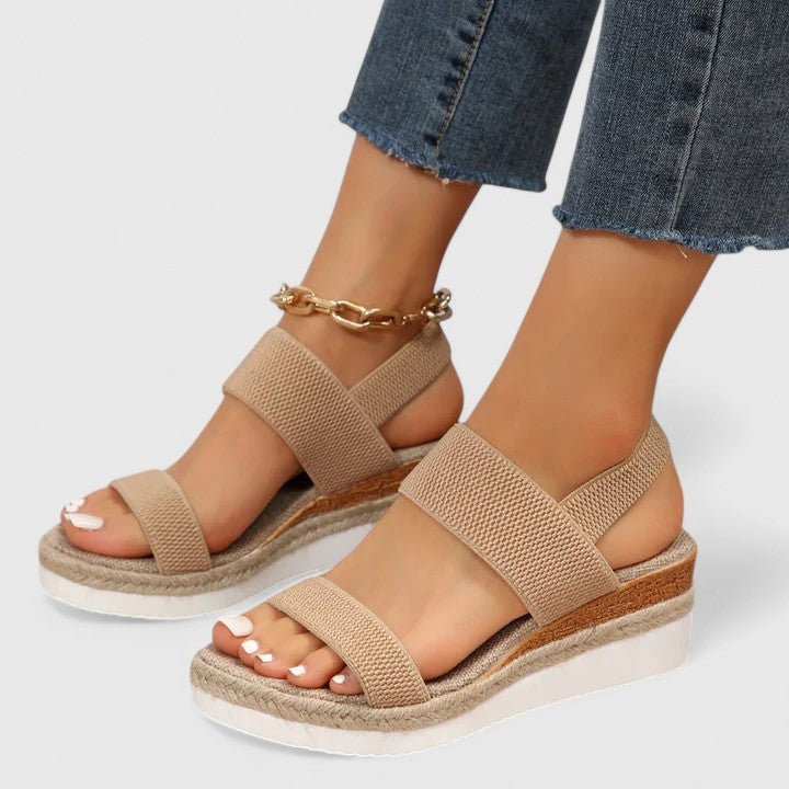Merill orthopedic wedge sandals in beige, front view on model
