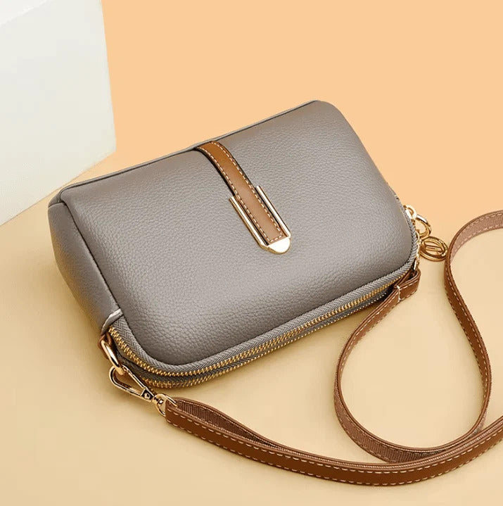 Emanuela crossbody bag in grey, angled top view