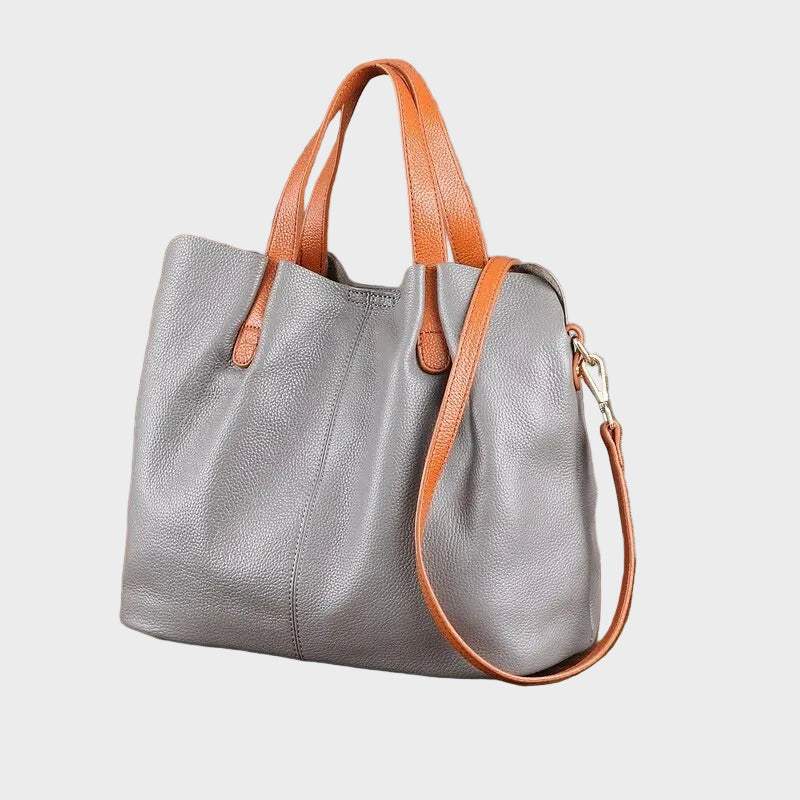 Alana tote bag in grey, angled side view with shoulder strap