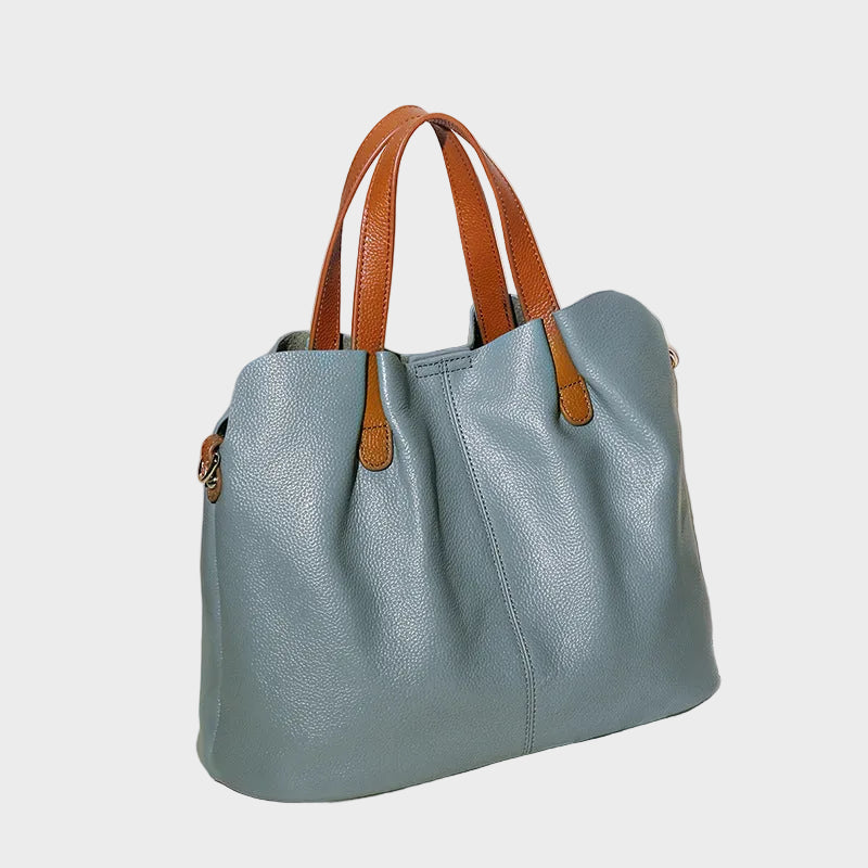 Alana tote bag in blue, angled side view