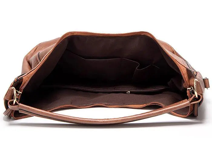 Ysolde leather hobo bag in brown, lined interior with pockets