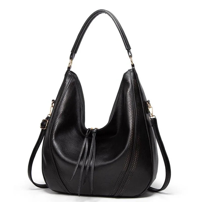 Ysolde slouchy leather hobo bag in black, front view