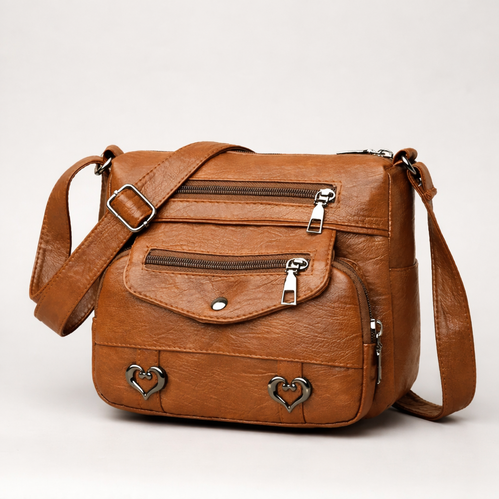 Verona crossbody bag in brown, front view with zip pockets