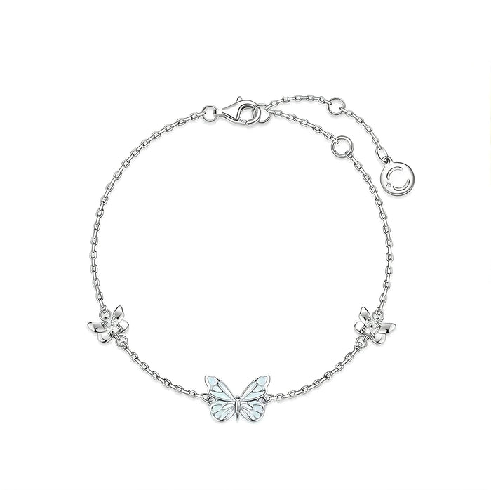 Luminous blue butterfly bracelet in silver tone, full chain laid flat