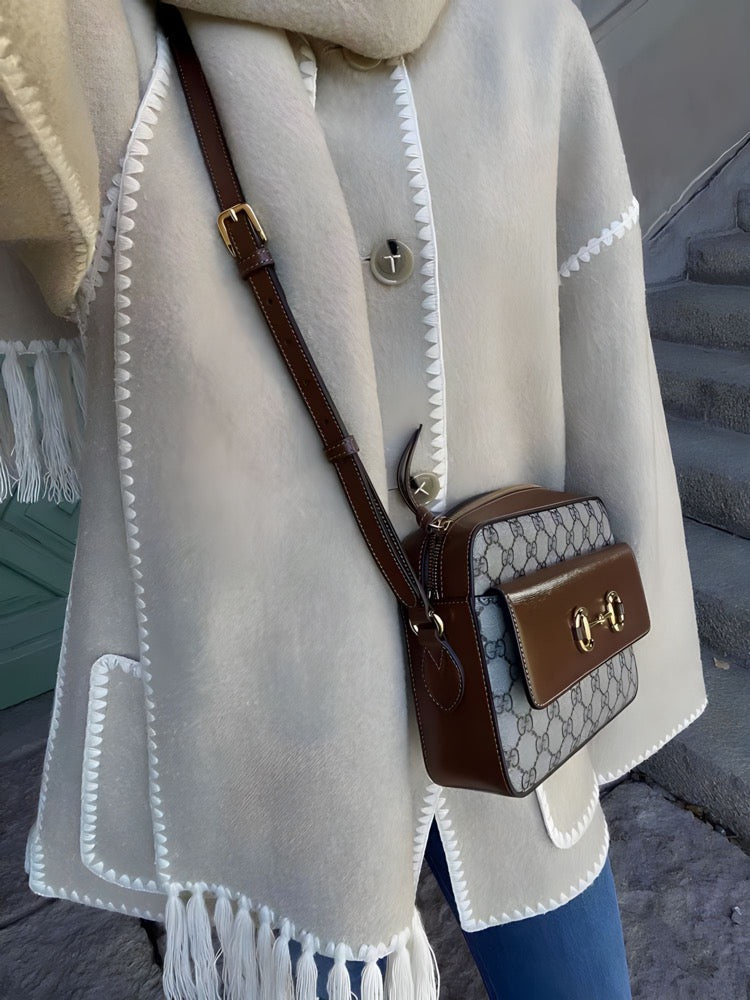 Zyra fringed scarf jacket in cream, close view of stitching and pocket