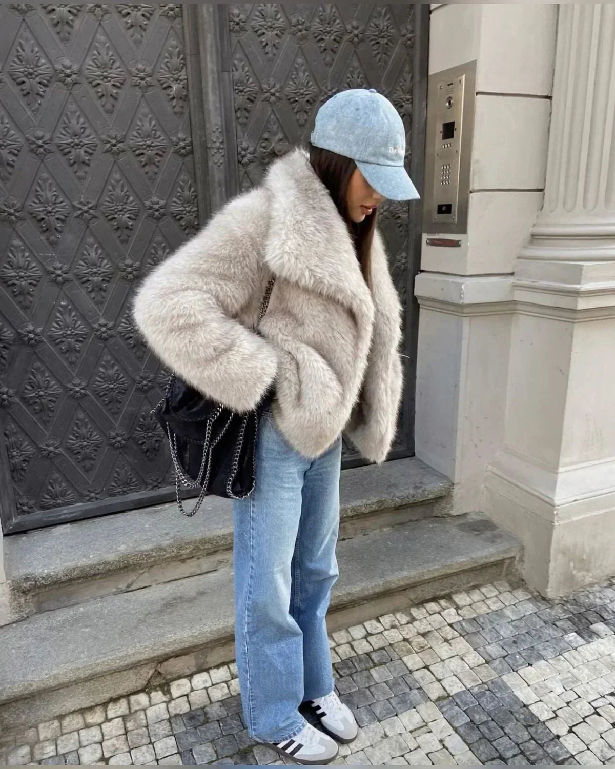 Fiorina faux fur jacket in light beige, worn side view on the street