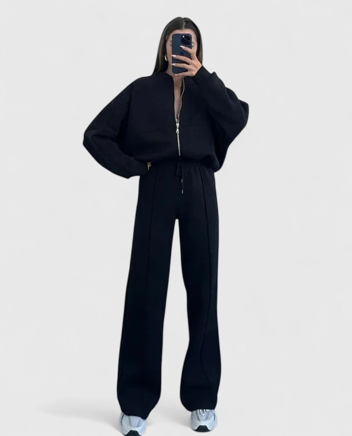 Olyverrah sweater and trouser set in black, full-length front view