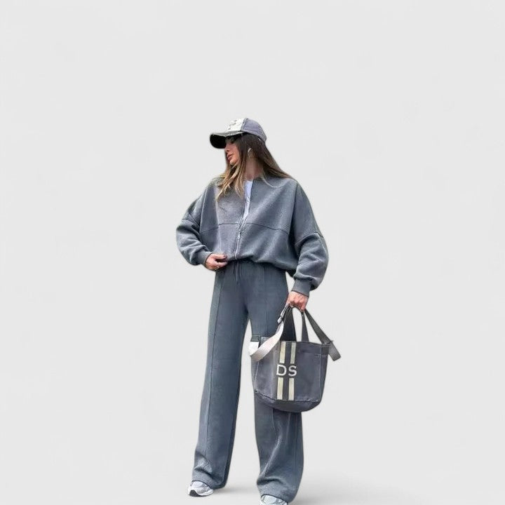 Olyverrah sweater and trouser set in grey, full-length front view