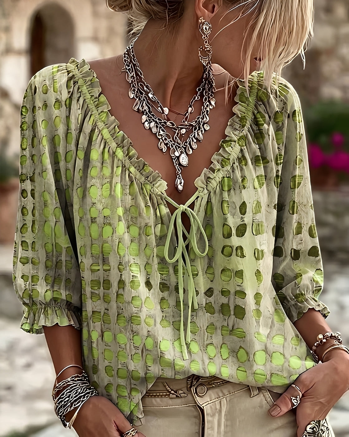 Candice polka-dot blouse in green, front view on model