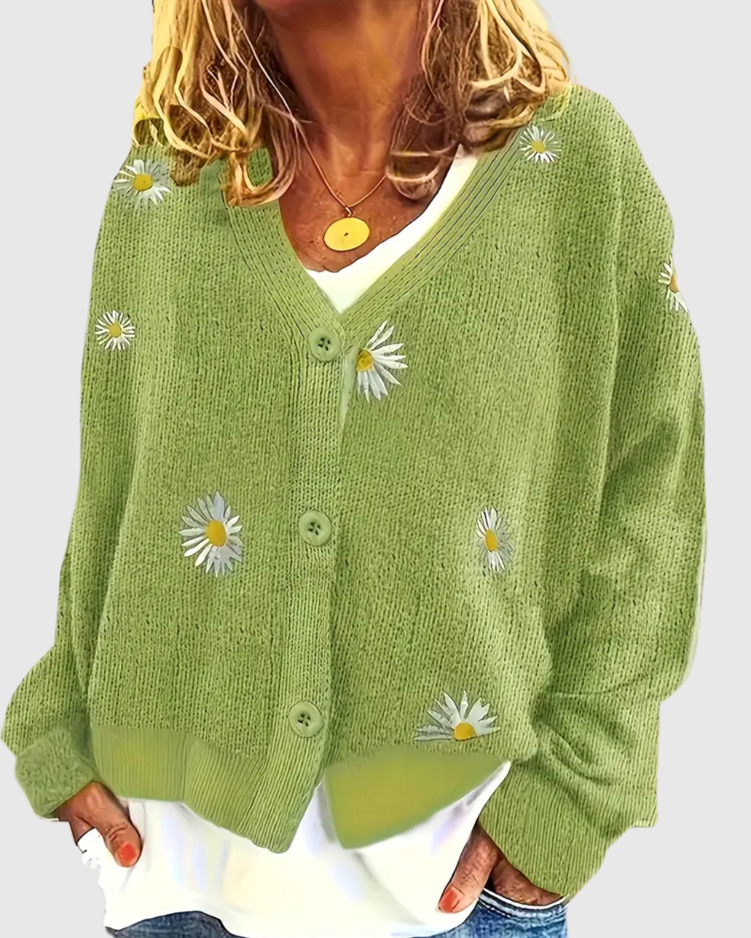 Irene knit button cardigan in green with daisy motifs, front view