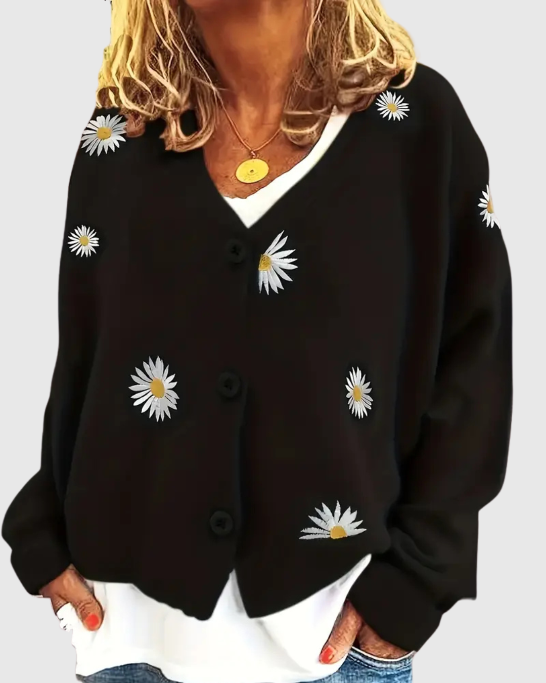 Irene knit button cardigan in black with daisy motifs, front view