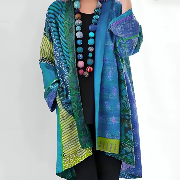 Dahlienne knit cardigan in blue print, worn over black top and leggings