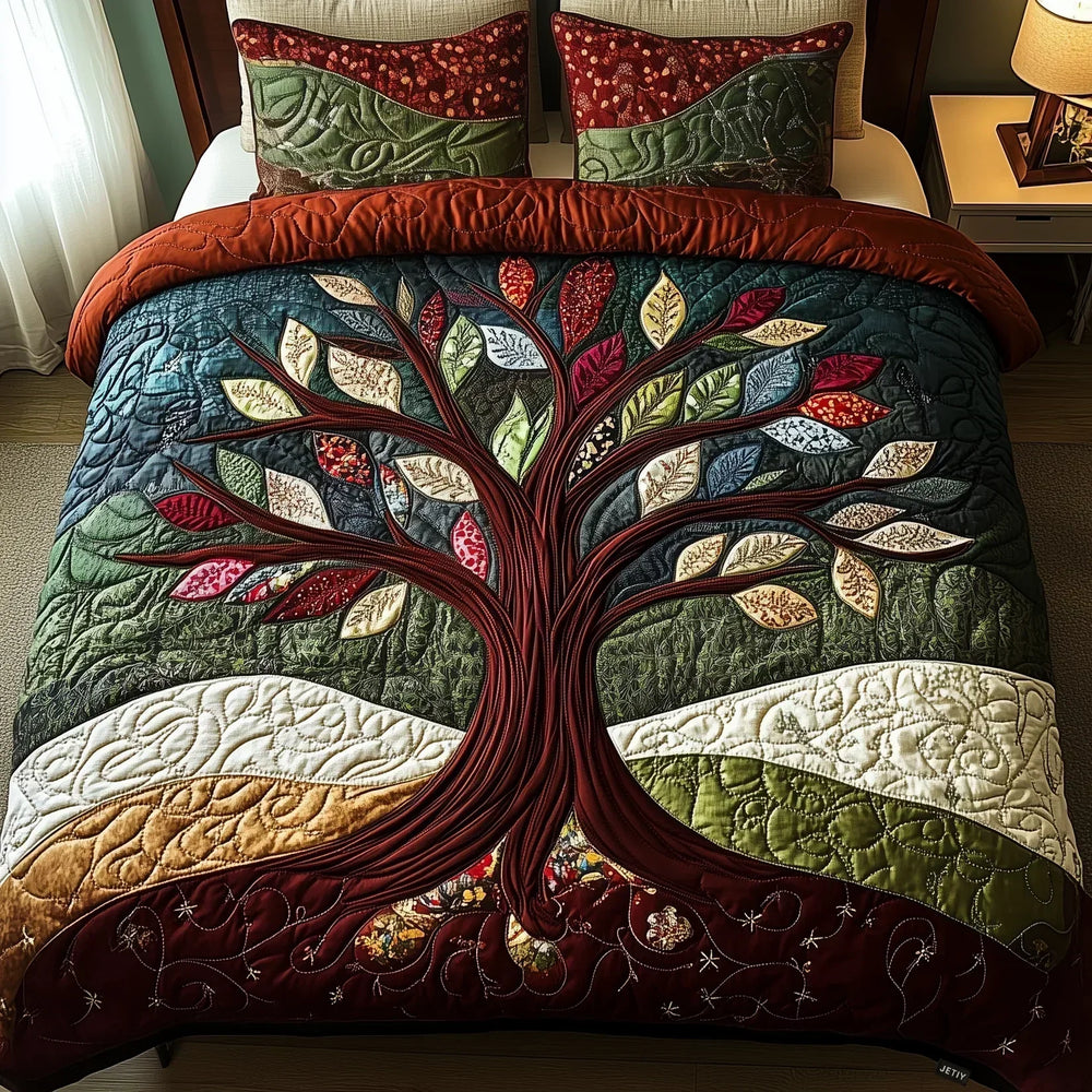 Nature's Embrace quilted bedding set with tree of life design in teal, green and deep red