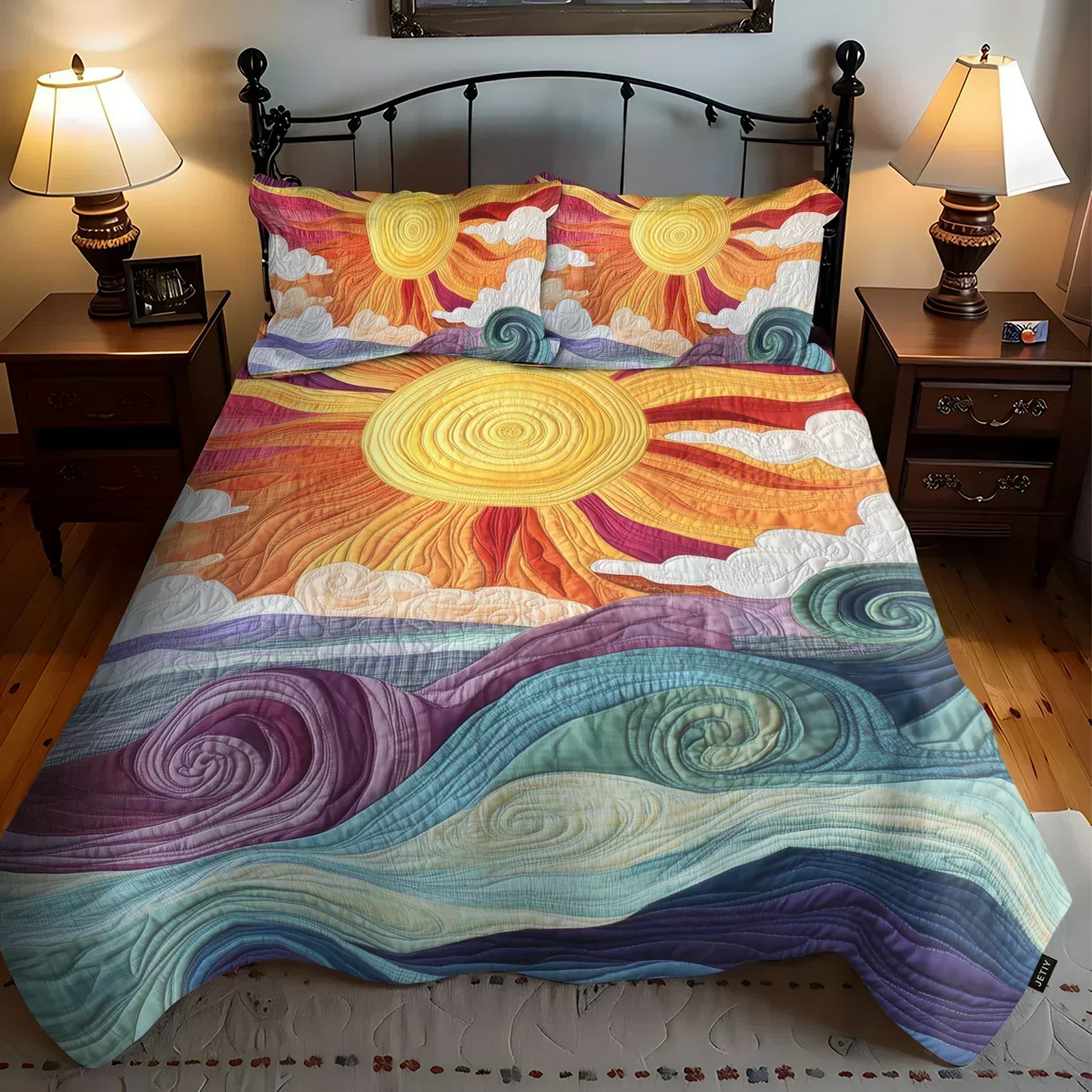 Solar Enchantment quilted bedding set with sun and wave design on a double bed