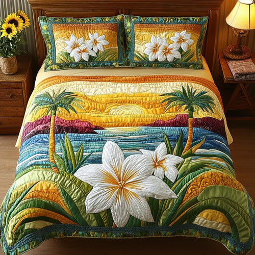 Aloha Spirit quilted bedding set with tropical palms, sunset and white flowers on a bed