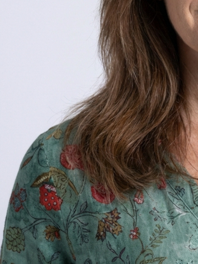 Marina floral maxi dress in green, close-up of V neckline and print