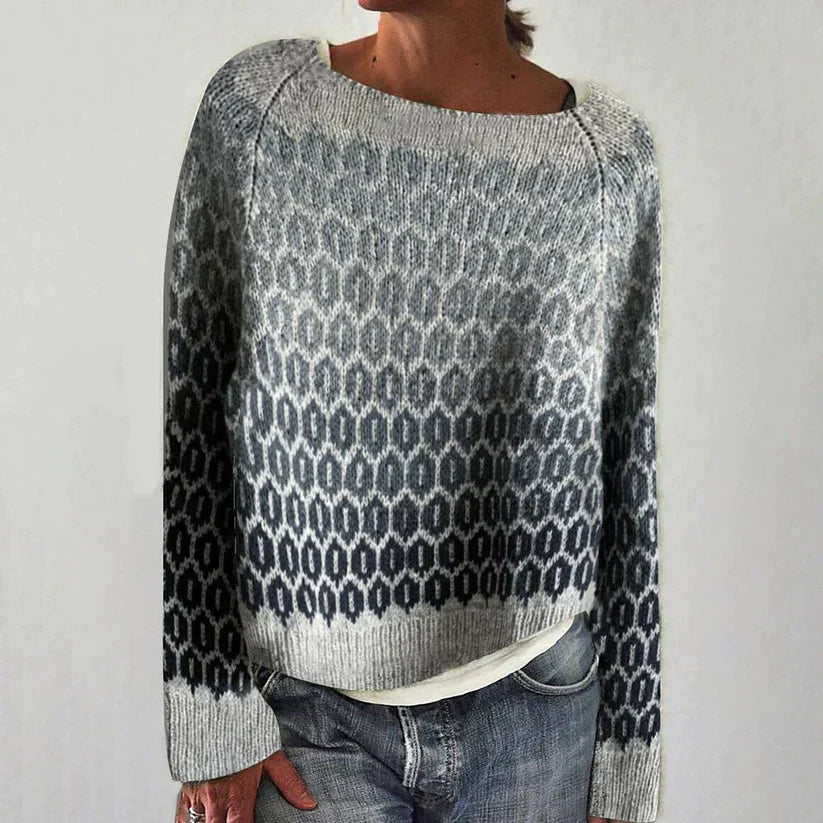 Sanya retro Scandinavian knitted sweater in grey, front view worn with jeans