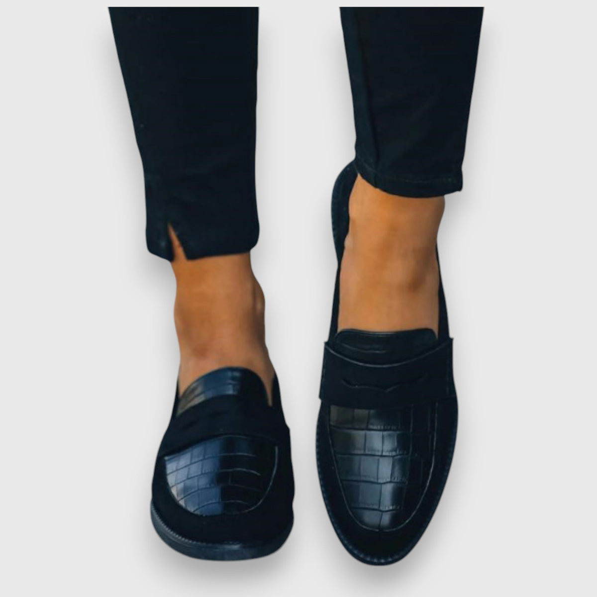 Juliette slip-on loafers in black, top-down worn view