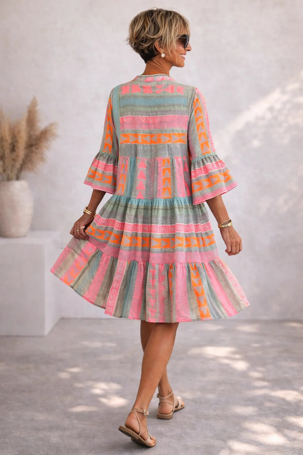Aurabelle tiered print dress, back view showing gathered tiers