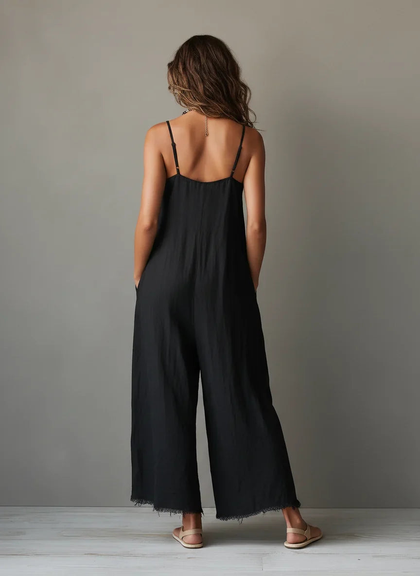 Léa minimalist jumpsuit in black, back view showing adjustable straps