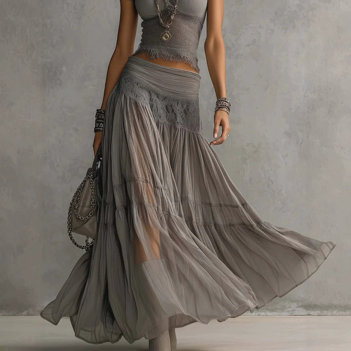 Beatrice grey pleated skirt, close-up of lace yoke and flowing hem