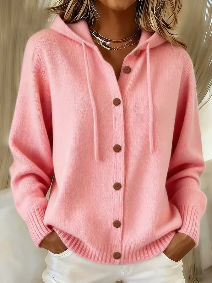 Begoña hooded button-up cardigan in pink, front view worn with white jeans