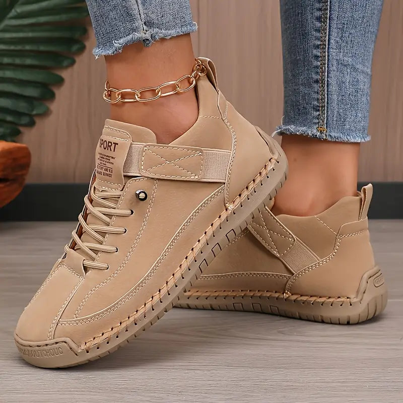 Mia orthopaedic trainers in beige, worn side view